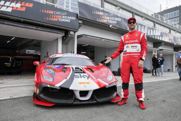 Mohamed Hamdy presenting his Ferrari outside the Valencia garage